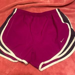 Purple Nike running shorts